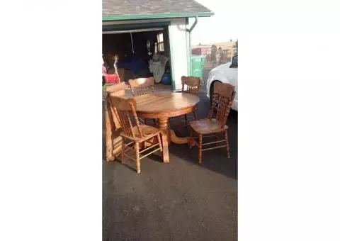 Oak table and four chairs with Leaf